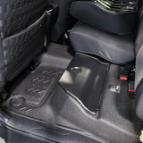 Rear driver side flooring showing close fitment around rear bin