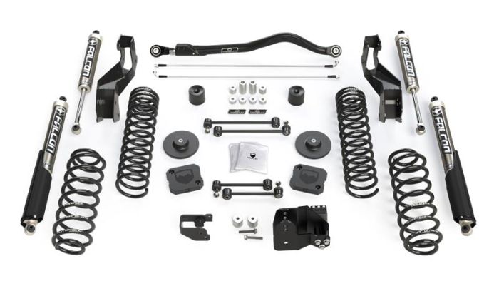 Collection of automotive suspension parts on a white background