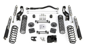 Collection of automotive suspension parts on a white background