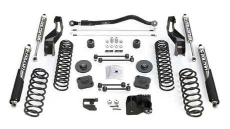 Collection of automotive suspension parts on a white background