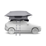 Roof top tent on a car with ladder on a white background