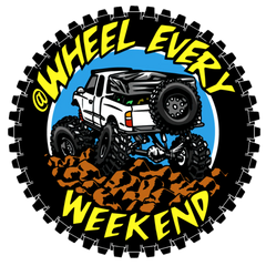Logo with a white truck on an off-road track, surrounded by tire treads and 'Wheel Every Weekend' text.