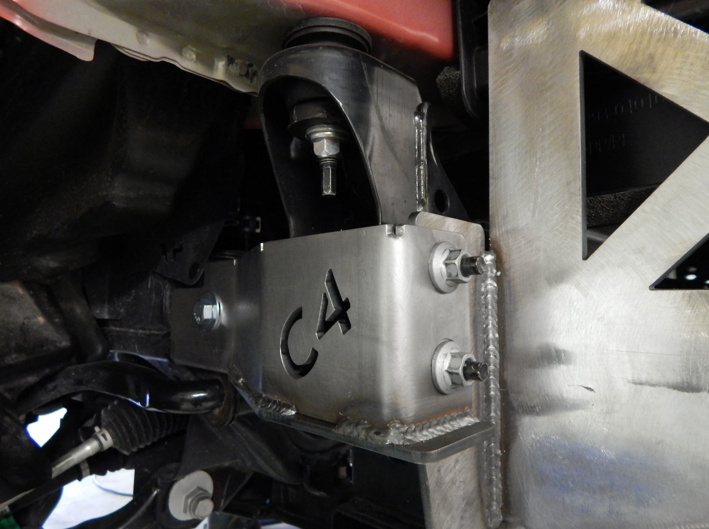 Frame Support Bracket with previous C4 logo (passenger side)