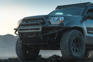 C4 Fabrication's 2012-2015 Tacoma Hybrid Front Bumper with Mid Height Bull Bar